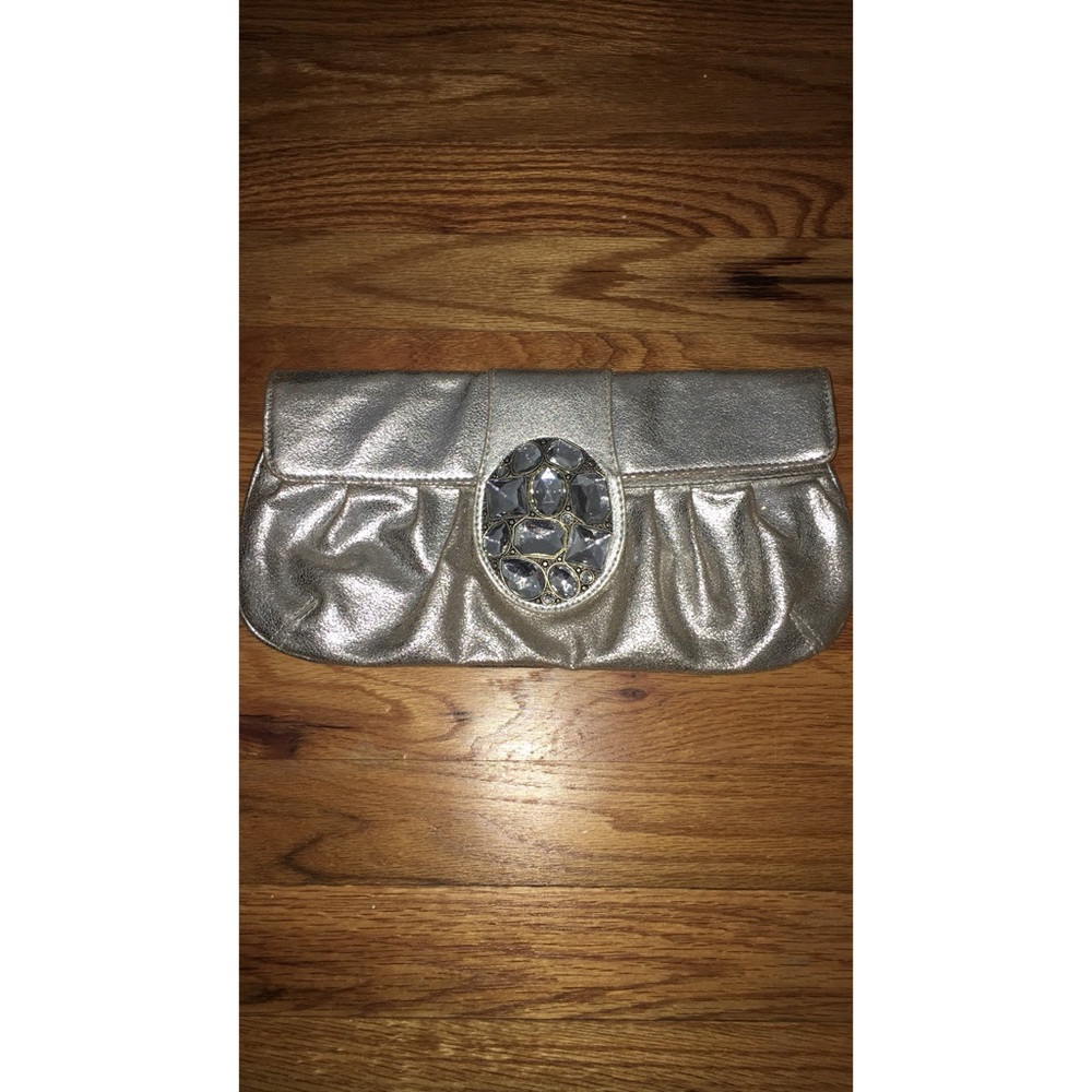 New DSW Silver Clutch